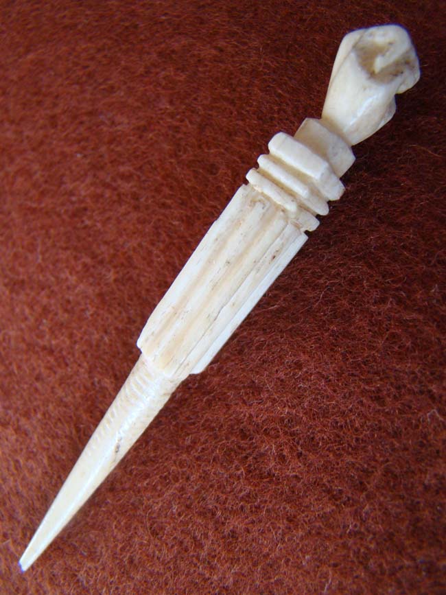 A 19th century sailor-carved whalebone bodkin